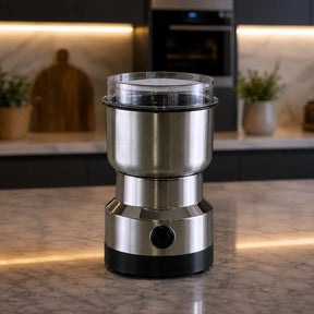 Dona Lili CoffeeGrind™ – Moedor Elétrico de Café e Especiarias em Aço Inox